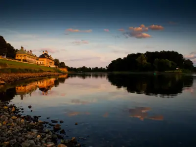 Dresden at night. Elbe river view to castle Pillnitz.